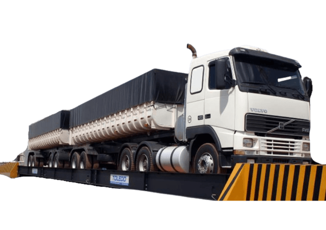 Two each of gray, white, and black shirts laying flat.